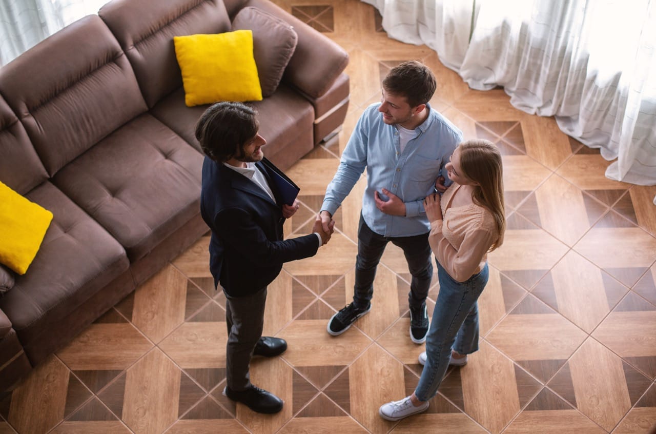Cheerful married couple and friendly realtor shaki 2025 03 18 17 43 22 utc large
